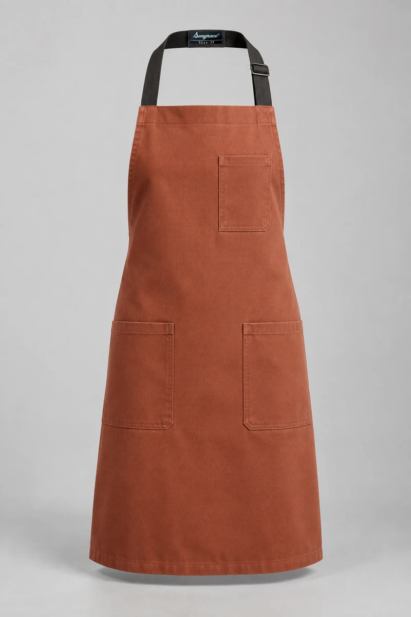 Sungrace bib aprons design 5: Terracotta Service, showing the genuine Sungrace woven label