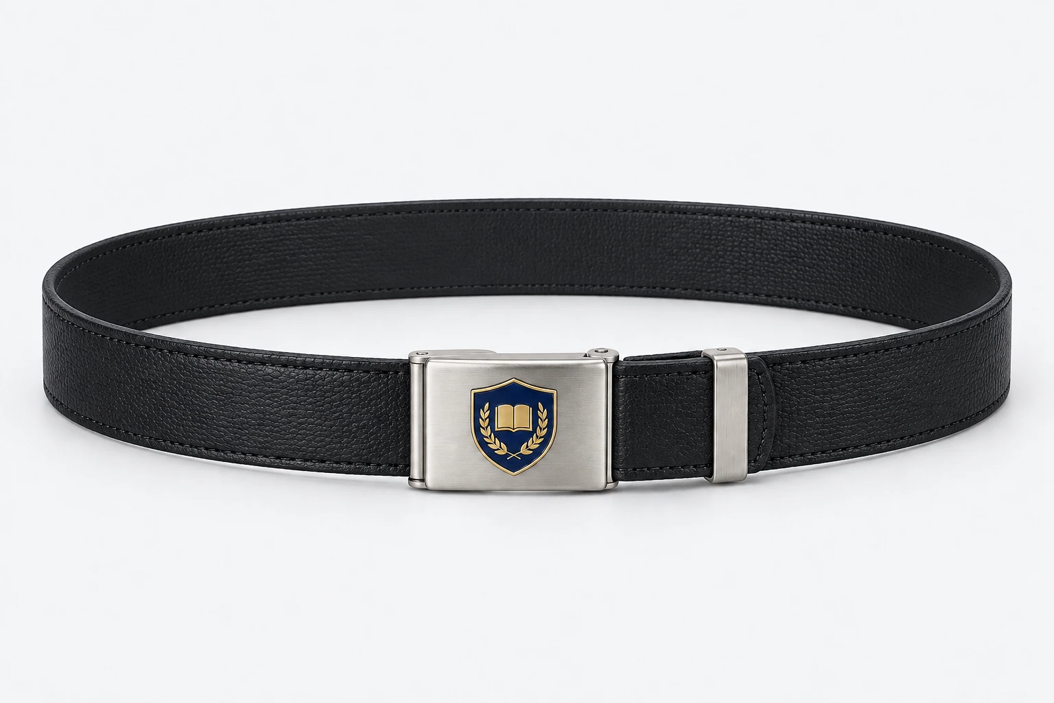 School Belts — black fine-grain faux-leather, silver rectangular plate buckle. product. Illustrative catalogue concept.