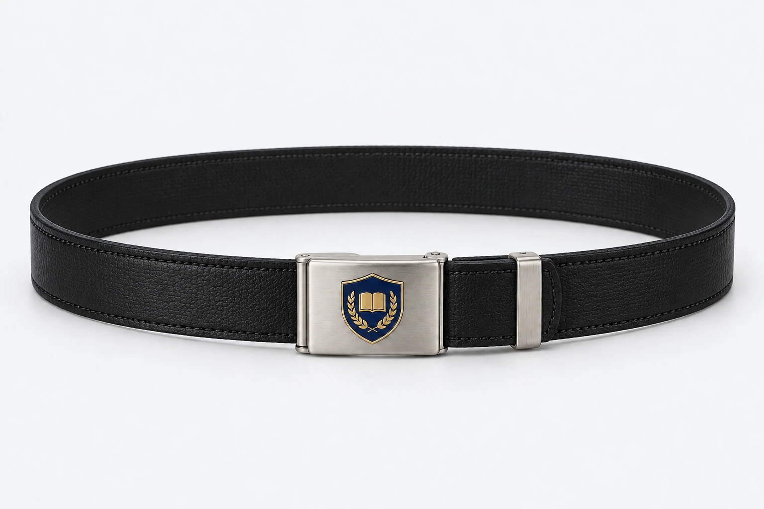 School Belts — black fine-grain faux-leather with double neat edge stitching, matte silver rectangular plate buckle. product. Illustrative catalogue concept.