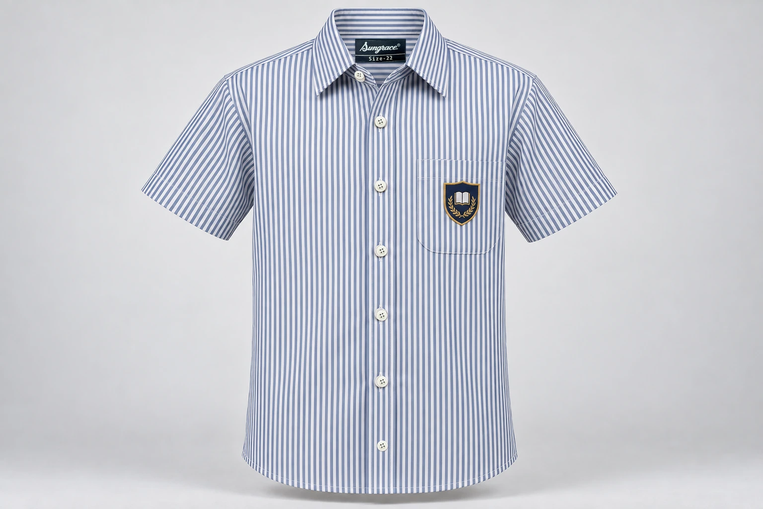 Half-Sleeve School Shirts — white and navy fine vertical stripe with sample crest. front product photograph. Illustrative catalogue concept.