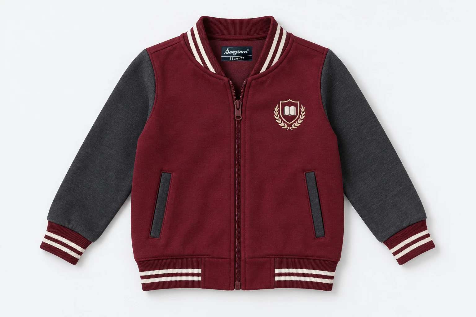 School Jackets for Small Children — maroon body with charcoal sleeves, varsity bomber ribbed collar cuffs hem with fine cream stripes, centre maroon zipper not snaps. product. Illustrative catalogue concept.