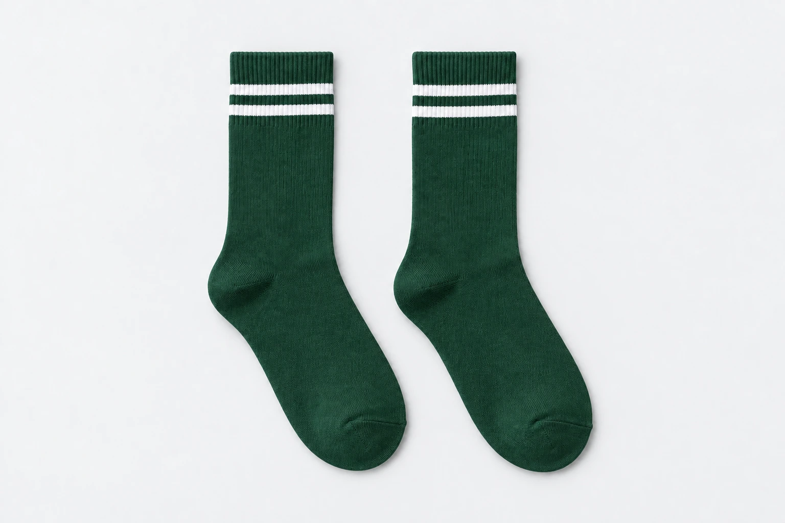 School Socks — bottle green crew socks with two white cuff bands. product. Illustrative catalogue concept.