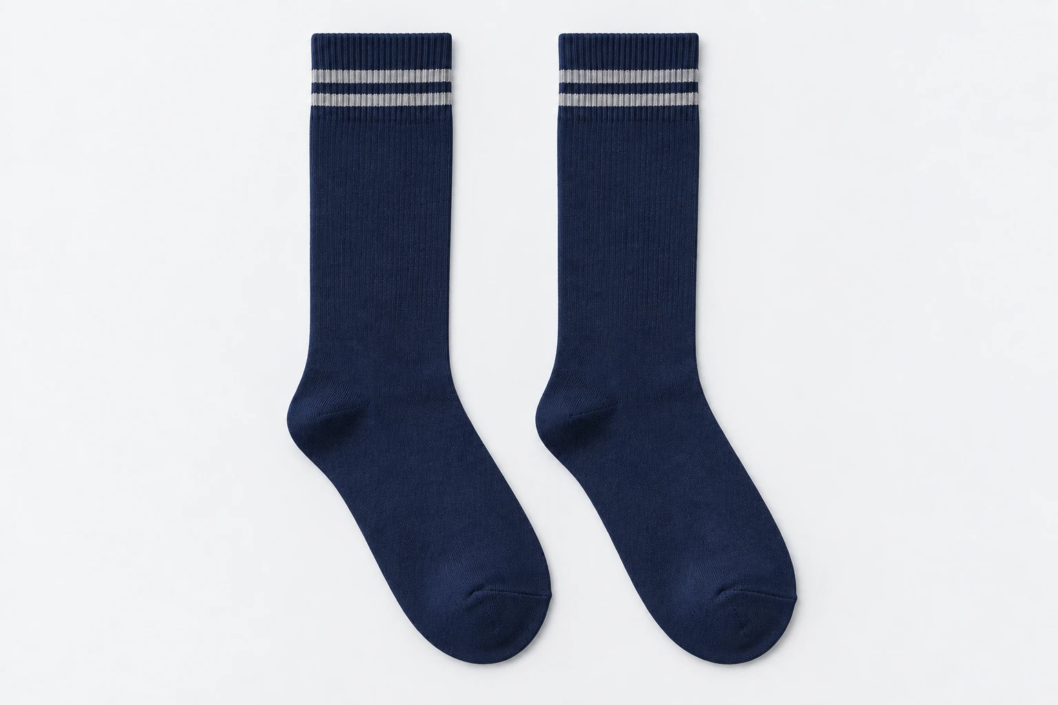School Socks — navy knee-high socks with thin grey cuff bands. product. Illustrative catalogue concept.