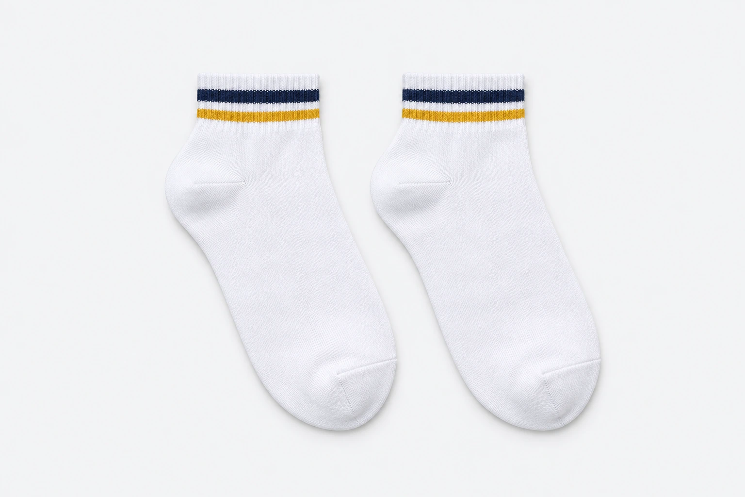 School Socks — white short-cuff socks with navy and gold cuff bands. product. Illustrative catalogue concept.
