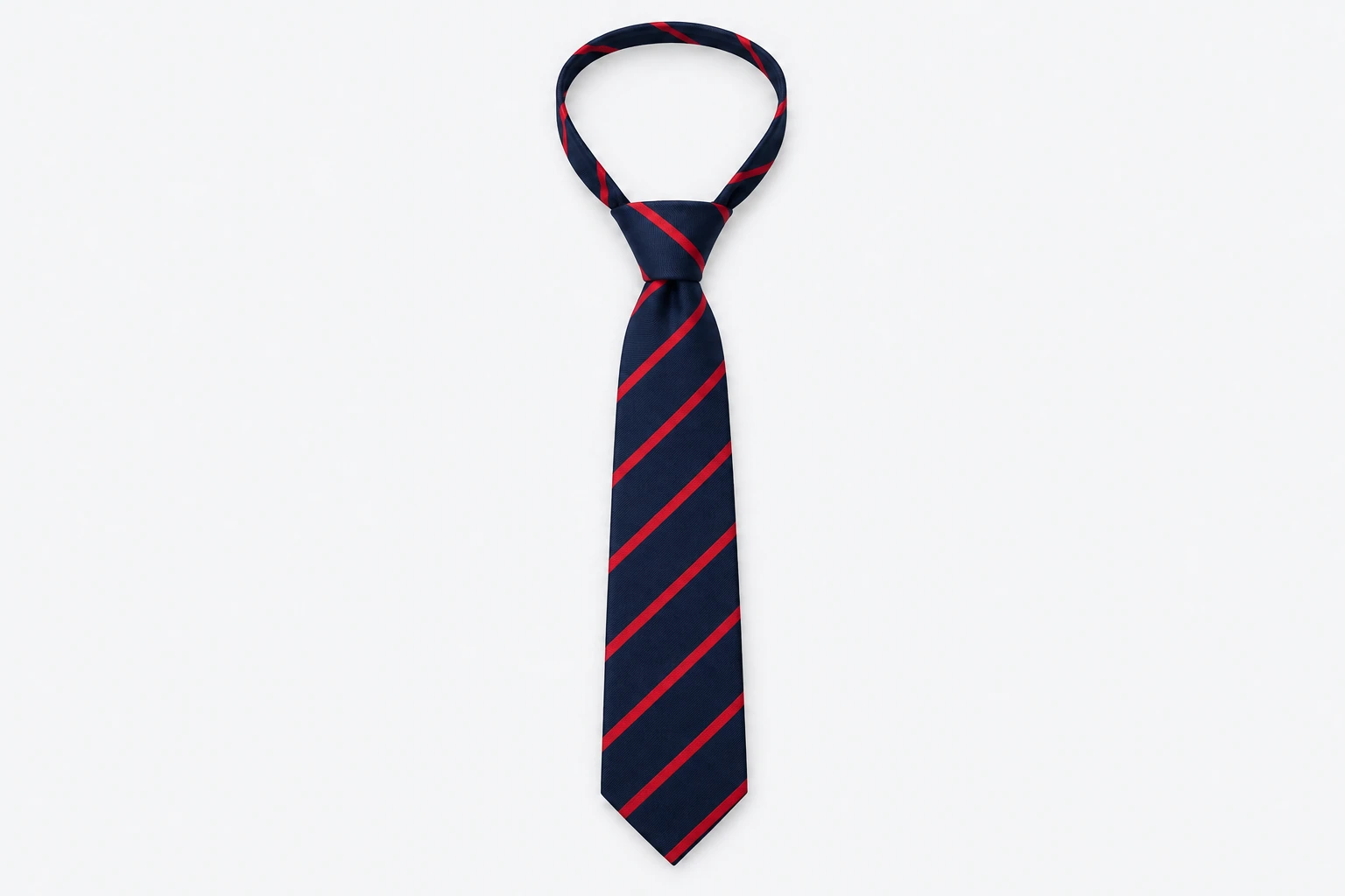 School Ties — navy pre-tied tie with narrow red diagonal stripes. product. Illustrative catalogue concept.