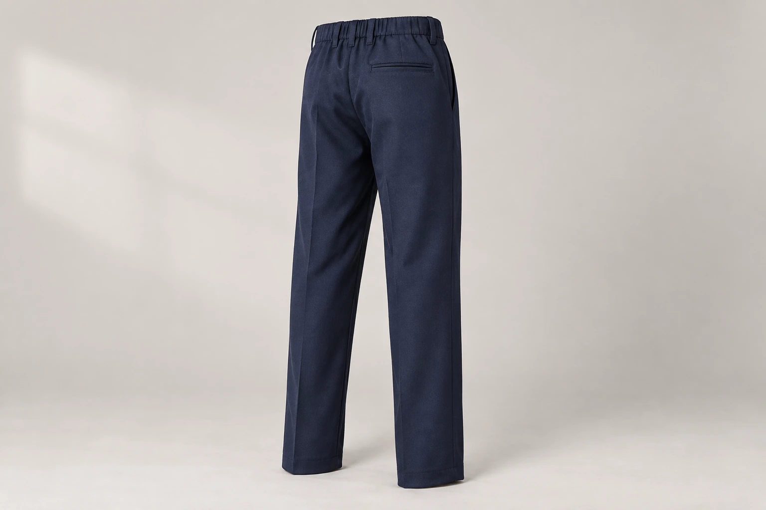 School Trousers — Navy school trousers with adjustable waistband. product rear. Illustrative catalogue concept.