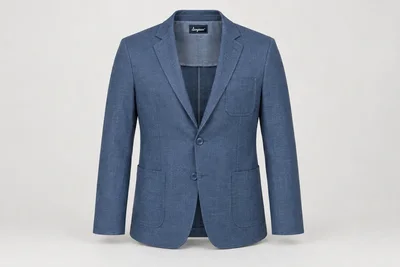 Blazers — Men's steel-blue unstructured blazer, notch lapels, lower patch pockets and upper patch pocket, tonal blue buttons. product front. Illustrative catalogue concept.