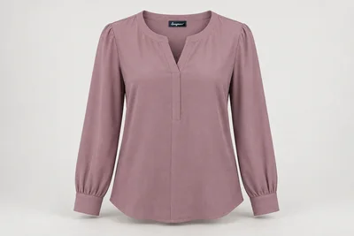 Corporate Blouses — Muted mauve women's long-sleeve blouse, modest round-neck with short clean slit, structured narrow cuffs. product front. Illustrative catalogue concept.