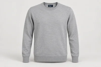 Corporate Knitwear — Adult unisex light-grey fine-gauge crew-neck long-sleeve sweater, ribbed cuffs and hem. product front. Illustrative catalogue concept.