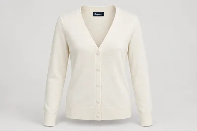 Corporate Knitwear — Women's ivory fine-gauge V-neck long-sleeve cardigan with ivory covered buttons. product front. Illustrative catalogue concept.