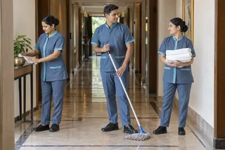 Details Behind Every Stay. Slate-blue housekeeping sets with muted teal trim. — collection preview