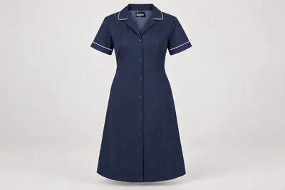 Nursing Dresses — Women’s navy below-knee nursing dress, short sleeves, white piping at collar and cuffs, concealed snaps. product front. Illustrative catalogue concept.