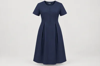 Nursing Dresses — Women’s navy below-knee nursing dress, short sleeves, modest round neckline, front zip and two controlled skirt pleats. product front. Illustrative catalogue concept.