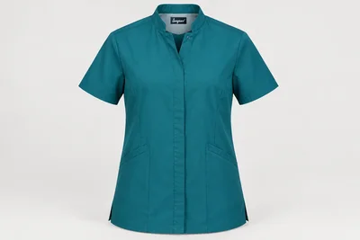 Nursing Tunics — Unisex teal short-sleeve tunic, mandarin collar, concealed snaps and two angled lower pockets. product front. Illustrative catalogue concept.