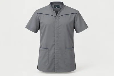 Nursing Tunics — Men’s steel-grey short-sleeve tunic with navy yoke piping, mandarin collar and two hip pockets. product front. Illustrative catalogue concept.