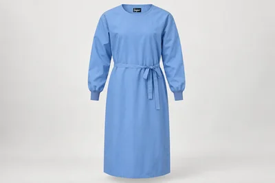 OT and Procedure Gowns — Unisex surgical-blue calf-length cloth procedure-gown concept with set-in long sleeves, knit cuffs and waist tie. product front. Illustrative catalogue concept.