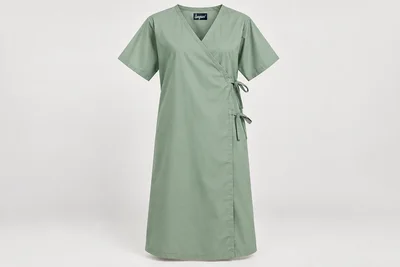 Patient Gowns — Unisex sage-green below-knee patient gown with modest overlapping side-wrap closure and short sleeves. product front. Illustrative catalogue concept.