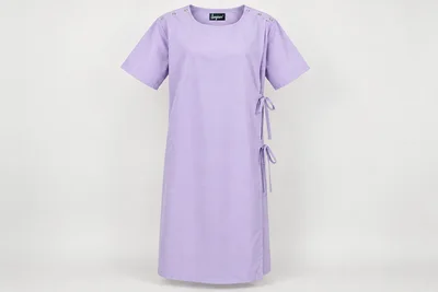 Patient Gowns — Unisex pale-lilac below-knee patient gown, short sleeves and discreet shoulder snap access. product front. Illustrative catalogue concept.