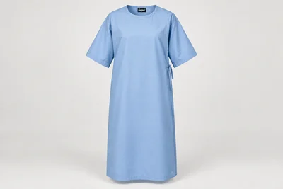 Patient Gowns — Unisex ceil-blue calf-length patient gown with elbow sleeves and full overlapping back coverage. product front. Illustrative catalogue concept.