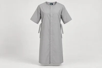 Patient Gowns — Unisex stone-grey below-knee patient gown with covered front snap placket and elbow sleeves. product front. Illustrative catalogue concept.