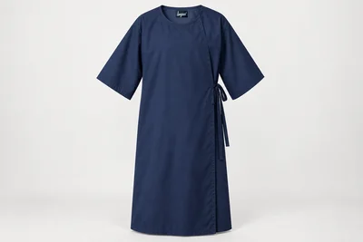 Patient Gowns — Unisex navy calf-length patient gown, wide elbow sleeves, generous rear overlap and side waist tie. product front. Illustrative catalogue concept.