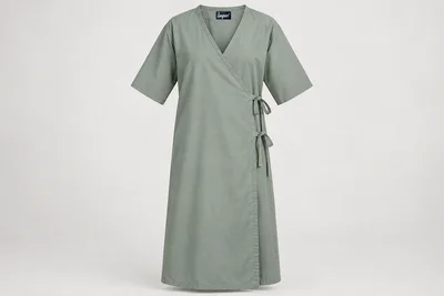Patient Gowns — Unisex sage-grey generously proportioned calf-length patient gown with elbow sleeves and secure full wrap coverage. product front. Illustrative catalogue concept.