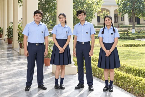 Catalogue design concept: Everyday Blue & Navy. Sky-blue shirts and pocket-free blouses with navy trousers and skirts. North Indian models in an Indian setting.