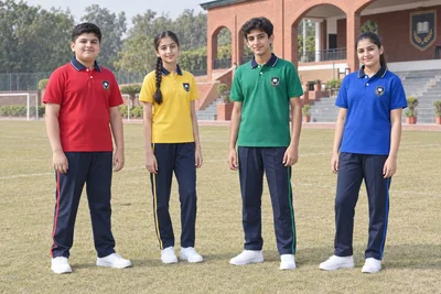 Catalogue design concept: House Colours on Campus. Red, yellow, green and royal-blue polos with coordinated navy sportswear. North Indian models in an Indian setting.