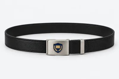 School Belts — black fine-grain faux-leather with double neat edge stitching, matte silver rectangular plate buckle. product. Illustrative catalogue concept.