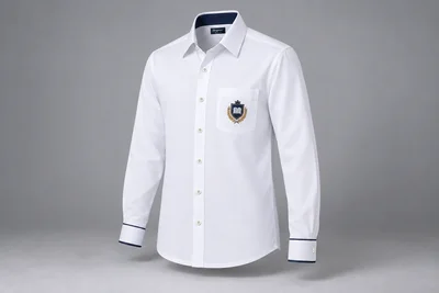 Full-Sleeve School Shirts — White with contrast cuff detail. front three-quarter product photograph. Illustrative catalogue concept.