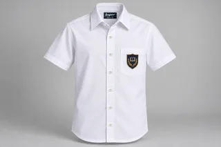 Half-Sleeve School Shirts — white with navy and gold sample shield crest. front product photograph. Illustrative catalogue concept.