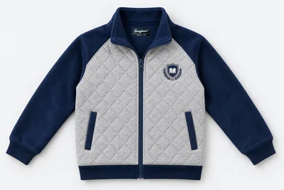 School Jackets for Small Children — light grey fine diamond-quilt front with navy fleece sleeves and stand collar, full navy zip, blue pocket trim. product. Illustrative catalogue concept.