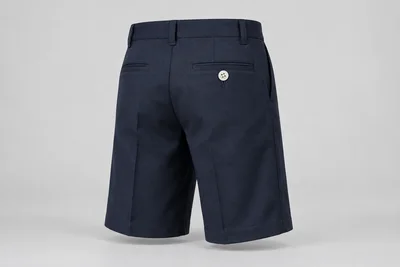 School Shorts — Navy longer-length short. rear three-quarter product photograph. Illustrative catalogue concept.