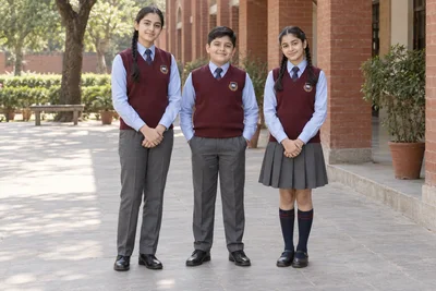 Sleeveless School Sweaters — Burgundy V-neck with powder-blue shirts. model. Illustrative catalogue concept.