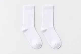 School Socks — plain white crew socks. product. Illustrative catalogue concept.
