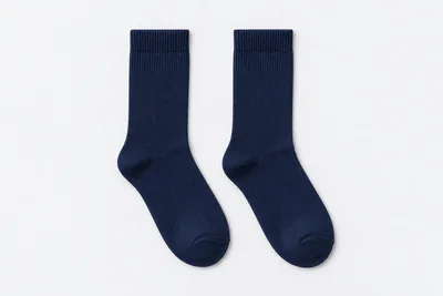 School Socks — deep navy crew socks. product. Illustrative catalogue concept.