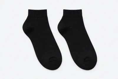 School Socks — plain black ankle socks. product. Illustrative catalogue concept.