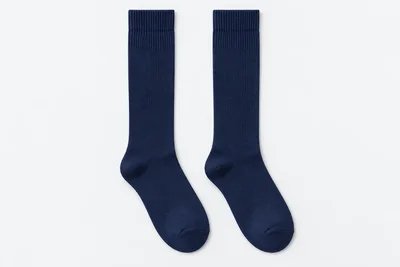 School Socks — navy knee-high ribbed socks. product. Illustrative catalogue concept.