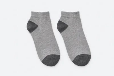 School Socks — grey marl short-cuff socks with darker grey heel and toe reinforcement. product. Illustrative catalogue concept.