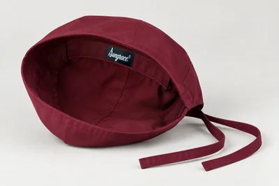 Scrub Caps — Wine woven low-profile scrub cap with adjustable fabric back ties. product rear three-quarter. Illustrative catalogue concept.