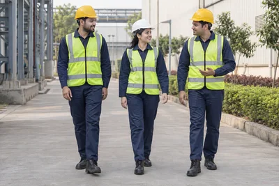 Catalogue design concept: A Coordinated Site Team. Navy workwear with high-visibility layers. North Indian models in an Indian setting.